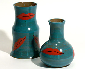 Pair of vases, turquoise with red lips