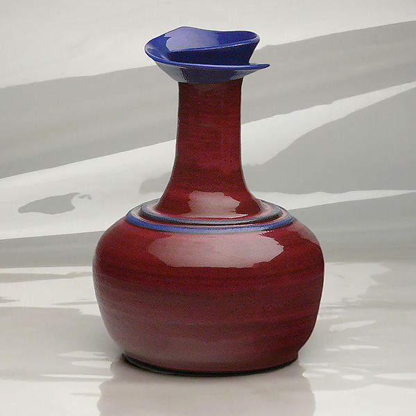 14-850. Georgia Vase. Long-necked spiraled mouth vase.
